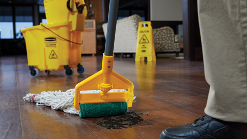 Hotel staff cleaning floor