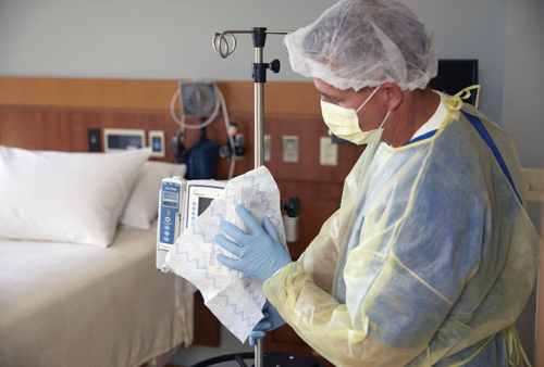 Hospital staff cleaning with hygen disposable micrfoibre cloth