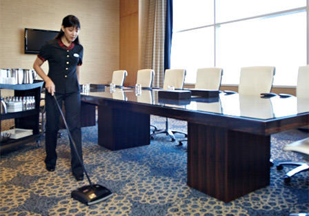 Carpet cleaning by hotel staff