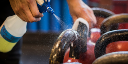 Sanitiser sprayed on weights