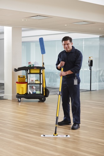 A person mopping the floor using Rubbermaid Microfibre Mops