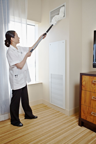 Woman mopping the ceiling